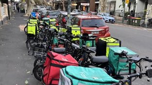 Hundreds of e-bikes used for food delivery and share hire clutter Victoria St in Kings Cross. Supplied